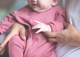 newborn-holding_your_baby-home