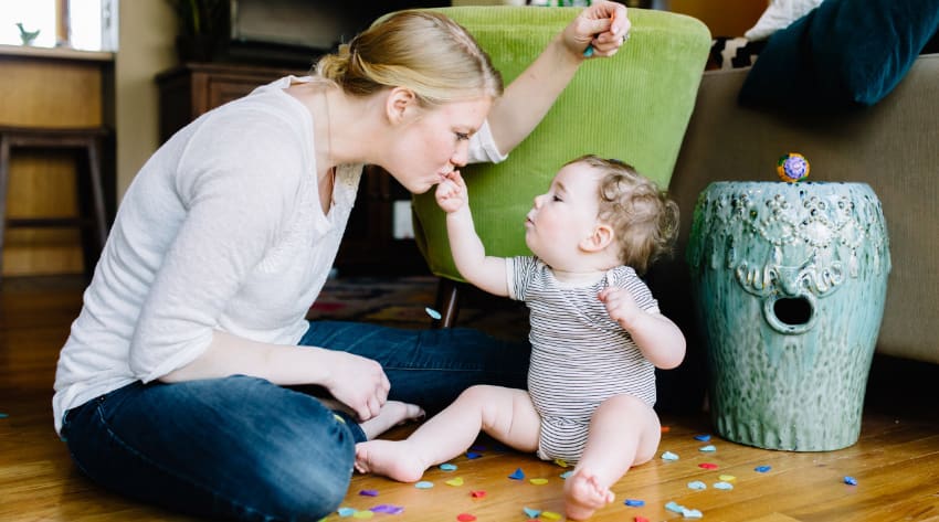 Toddler and mother playing together