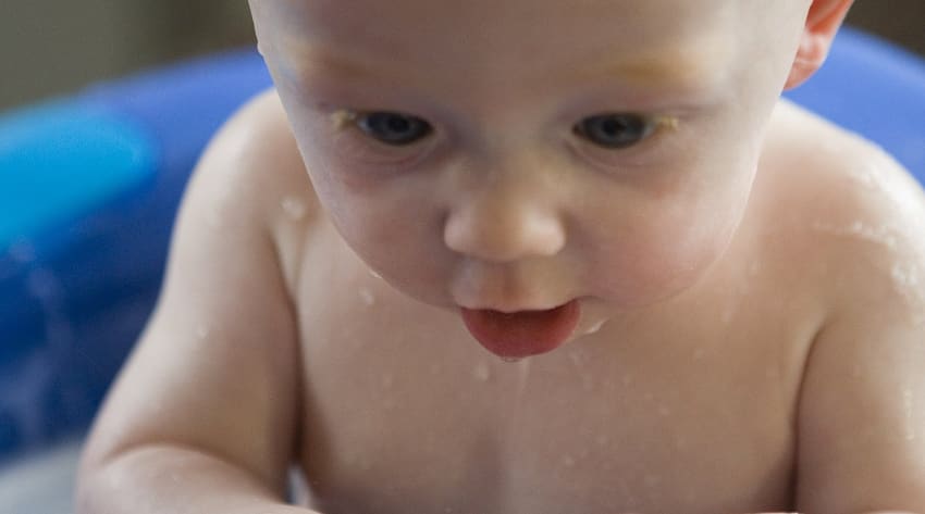 Baby playing in the bath