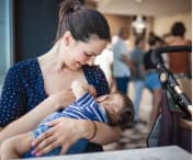 Mother breastfeeding in public