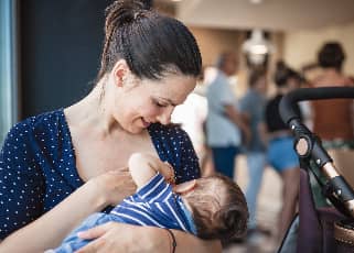 Mother breastfeeding in public