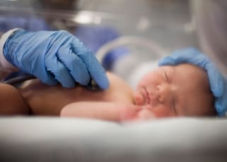 doctor-checking-premature-baby-heartbeat