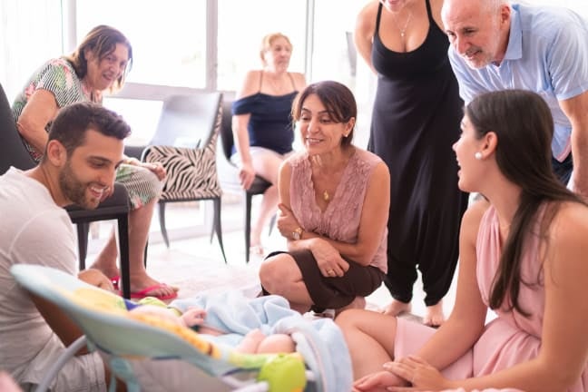 Visitors meeting the baby for the first time