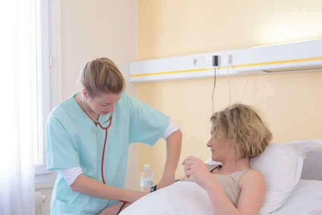 A mother being prepped for a C-section